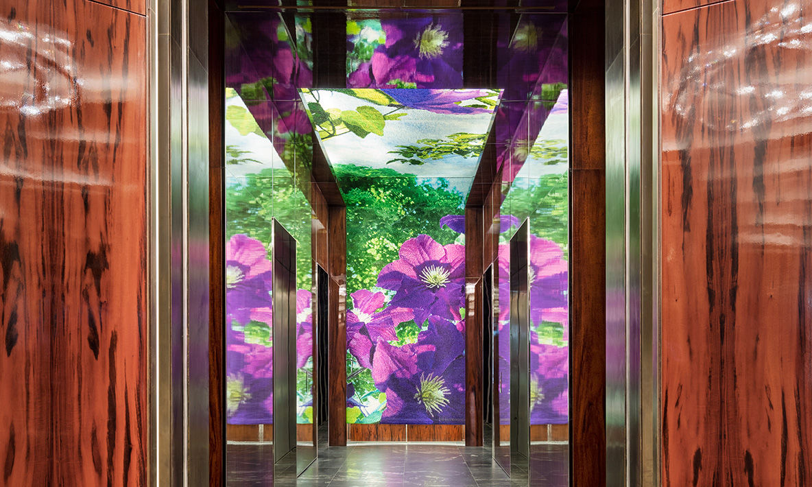 Elevator lobby featuring tapestry, Flowers